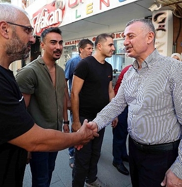 baskan-buyukakin-karamurselde-esnafla-bulustu.jpg